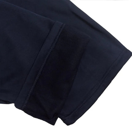 Close-up of a black fleece-lined sleeve from the Conjunto Polar Frost Peak for Men, highlighting soft interior and cozy design.