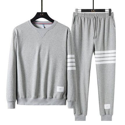 Conjunto de buzo y pantalón Drupin para hombre en gris, diseño moderno y cómodo, ideal para uso informal y en casa.
