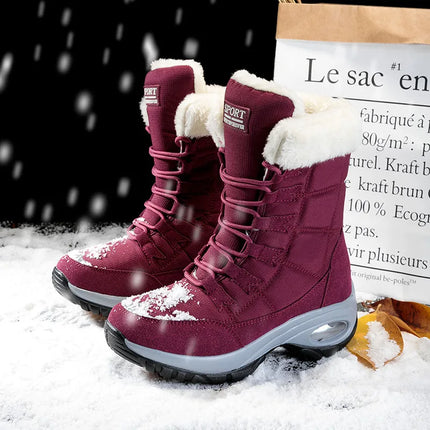 Women's high-quality winter boots with warm lining in snowy setting, featuring durable design and stylish red color.