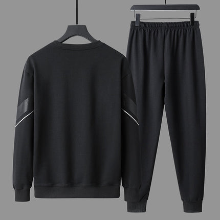 Men's urban minimalist trucker set with pullover and jogger pants in black, showcasing a clean, modern style for everyday wear.