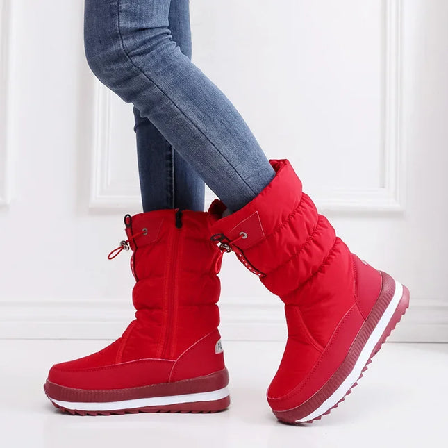 Red waterproof women's snow boots with synthetic leather, perfect for winter wear, shown in side view against a white background.