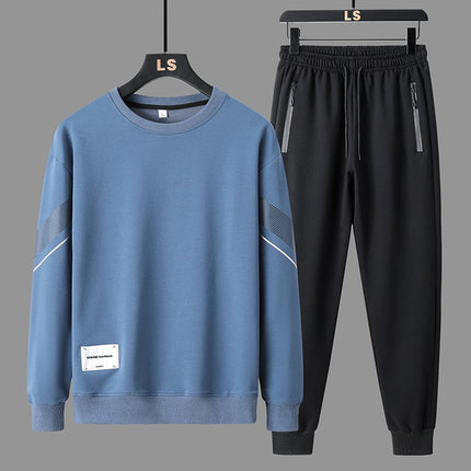 Conjunto Trucker para hombre en azul y negro, estilo urbano minimalista, con suéter y joggers elásticos, ideal para un look moderno.