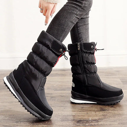 Women's black waterproof synthetic leather snow boots with zipper, designed for winter comfort and style.