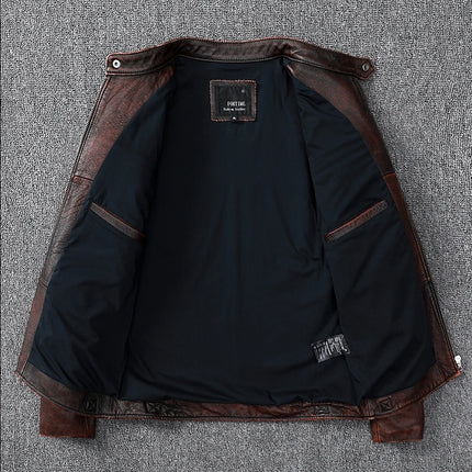 Interior view of a men's brown 100% cowhide leather jacket, showcasing high-quality lining and durable craftsmanship.