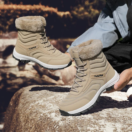 Warm men's hiking boots with fur lining, beige color, shown outdoors on a rock terrain.
