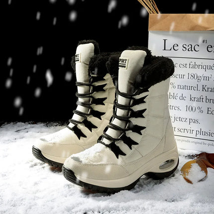 High-quality women's winter boots with fur lining and lace-up design, displayed on snowy ground.
