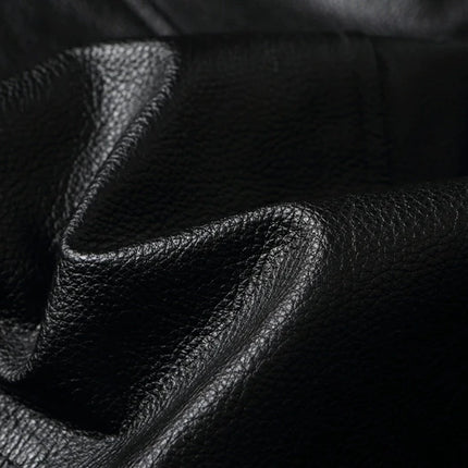 Close-up of black 100% cow leather fabric used for jackets