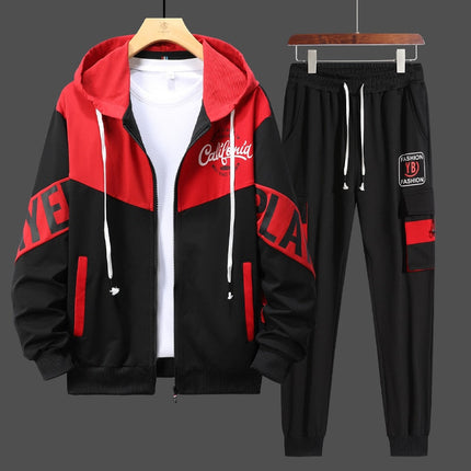 Conjunto deportivo urbano para hombre, buzo rojo y negro con capucha y pantalones con cintura elástica, detalles gráficos modernos.