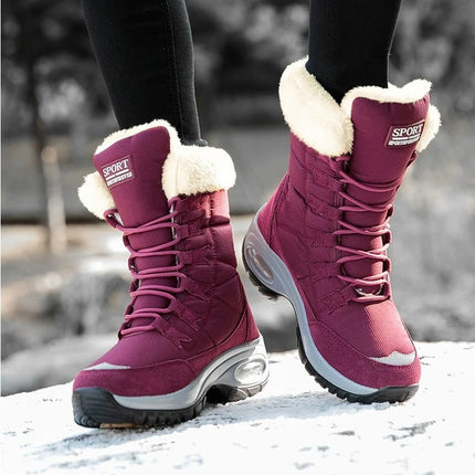 High-quality women's winter boots in red with fur trim, designed for warmth and comfort in cold weather.