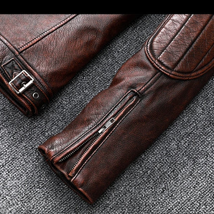 Close-up of 100% cowhide leather jacket sleeve with zipper and buckle details, showcasing premium craftsmanship.