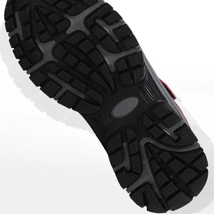 Sole of warm, waterproof, non-slip snow boot with durable tread design.