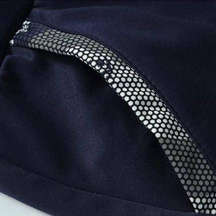 Close-up of navy blue pocket with mesh lining from men's Polar Frost Peak pants.