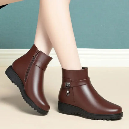 Bota de cuero Nube Polar para mujer, diseño bajo con forro suave, ideal para días fríos. Botas de mujer elegantes y cómodas.