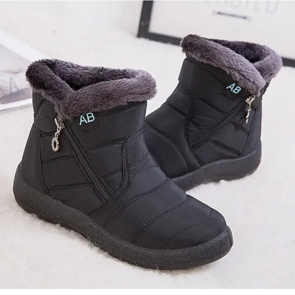 Botas de mujer impermeables negras con abrigo interno de felpa y diseño elegante, ideales para invierno en Argentina.
