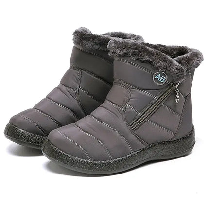 Botas de mujer impermeables con abrigo de felpa, diseño moderno y elegante, tacón bajo y cierre lateral, ideales para el invierno argentino.