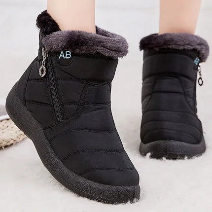 Botas de mujer impermeables, negras y elegantes, con felpa suave y cierre lateral para el invierno, estilo chic.