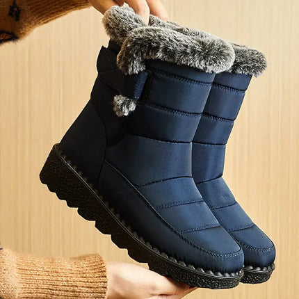Botas de mujer impermeables Bota Polar Trendy azules con interior de felpa, suela antideslizante y cierre velcro, ideales para invierno.