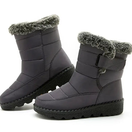 Botas de mujer Polar Trendy impermeables con diseño moderno, ideales para invierno, en color gris con interior de felpa suave y velcro.