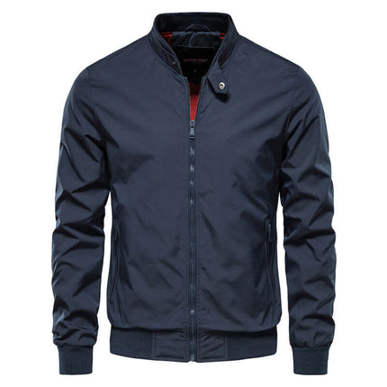 Campera Hombre Classic Luxury de nylon resistente, diseño deportivo retro con bolsillos laterales y cuello acanalado.