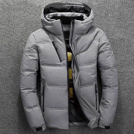 Campera térmica Urban Warm para hombre en gris con plumón y capucha desmontable, abrigo moderno para el invierno.