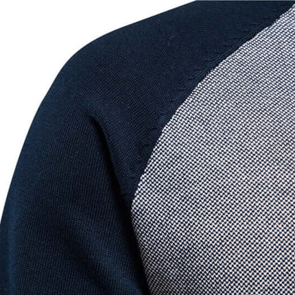 Detalle de campera para hombre "Madrid" de tejido texturizado en color azul y gris.
