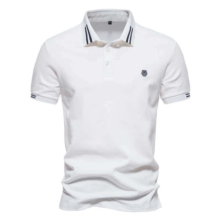 Chomba clásica de hombre 100% algodón, color blanco con detalles en el cuello, ideal para estilo casual. Compra ahora.