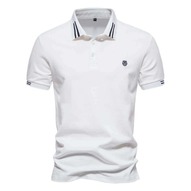 Chomba clásica de hombre 100% algodón, color blanco con detalles en el cuello, ideal para estilo casual. Compra ahora.