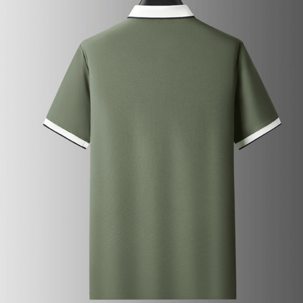 Chomba Odyssey hombre color verde con cuello distinto, ideal para oficina y uso diario. Tejido suave y estructurado. Moda masculina elegante.