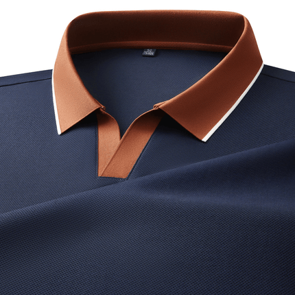 Chomba Odyssey para hombres, diseño elegante en tejido de punto azul con cuello marrón, ideal para uso diario y oficina.