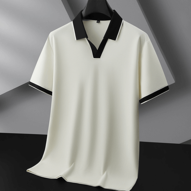 Chomba Odyssey hombre: estilo y comodidad en tejido suave, ideal para oficina y uso diario, con diseño elegante de cuello distintivo.