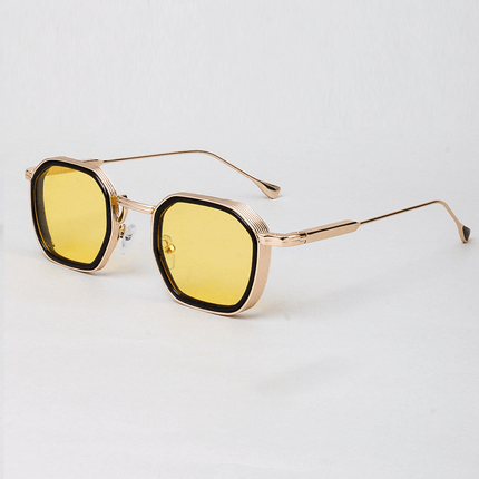 Gafas de sol hombre Alain Delon, diseño angular minimalista, estructura metálica refinada, lentes UV400, estilo clásico y sobrio.