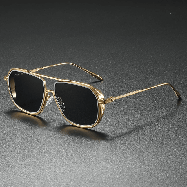 Gafas de sol Mykonos Navigator estilo retro para hombre, diseño navigator con protección UV400 y armazón dorado angular.