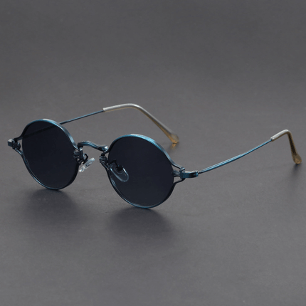 Gafas de sol redondas Cobain de metal, estilo clásico y audaz. Gafas de sol hombre con protección UV y diseño alternativo.