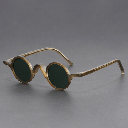 Gafas de sol retro para hombre con diseño escultural y puente curvado, ideales para un look llamativo y moderno.