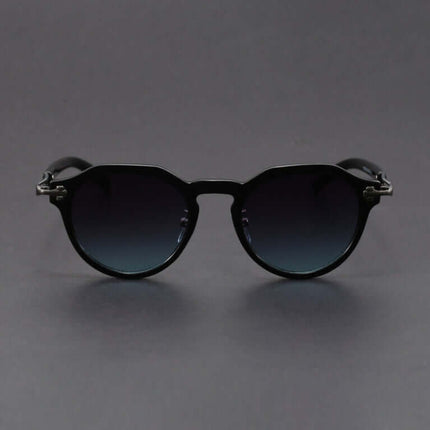 Gafas de sol hombre vintage Dylan con protección UV400, estilo retro con lentes oscuros degradados y detalles metálicos en las patillas.