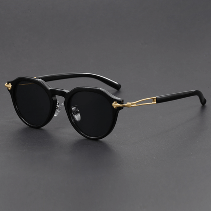 Gafas de sol vintage Dylan para hombre con protección UV400, estilo retro y moderno, lentes oscuros degradé y detalles metálicos.