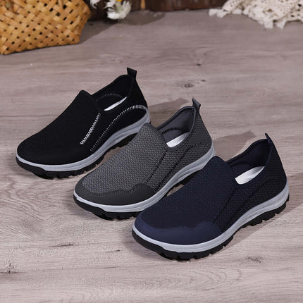 Zapatos informales para hombres Mocasín Comfort Walk en negro, gris y azul, con tejido transpirable y suelas suaves para mayor comodidad.
