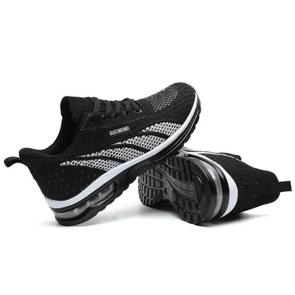 Black breathable ergonomic sneakers with anti-impact sole, 20% off today, offering comfort and support for daily activities.