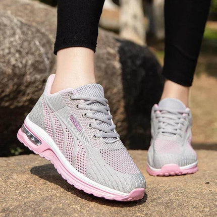 Zapatillas deportivas transpirables grises y rosas en oferta, diseño ergonómico para soporte y comodidad, suela anti-impacto.