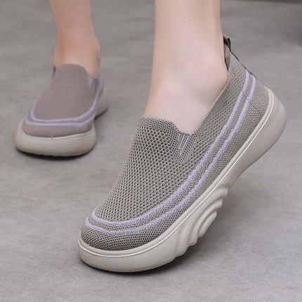 Grey breathable knit slip-on casual shoes for spring and autumn, designed to beautify feet with eye-catching colors.