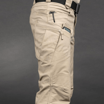 Men's tactical cargo pants showcasing durable fabric and multi-functional pockets, perfect for urban and work use.