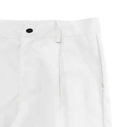 Close-up of versatile sports pants in white with pockets and a button, perfect for active lifestyles and casual wear.