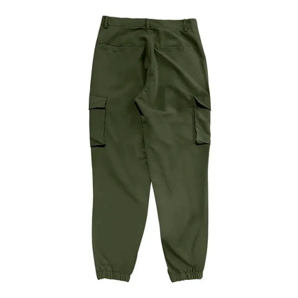 Versatile green sports pants with cargo pockets and elastic ankle cuffs.