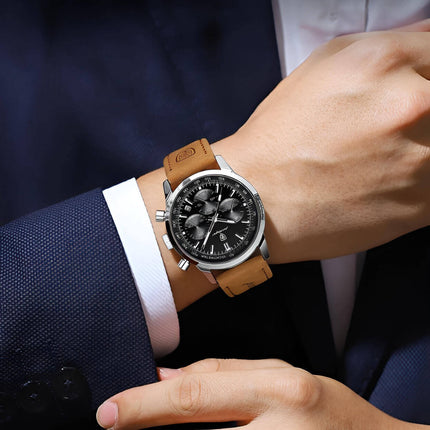 Hombre usando un Reloj Poedagar 911 con correa de cuero auténtico, diseñado en Suiza. Ideal en línea premium para eventos formales e informales.