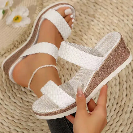 White open-toe wedge sandals for women, featuring a braided design and comfortable fit, ideal for summer style and ease.