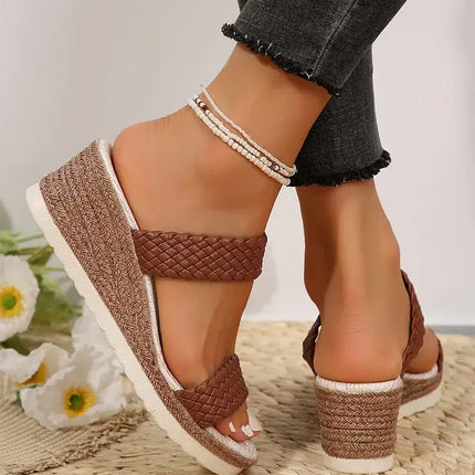 Woman wearing stylish Easy Step wedge sandals with open-toe design, perfect for summer comfort and fashion.