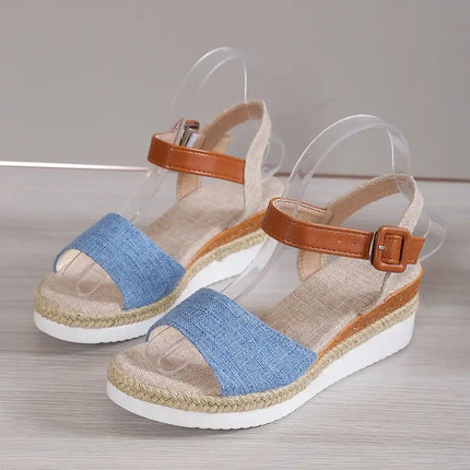 Stylish women's wedge sandals with a brown strap and blue fabric detail, perfect for summer events. Heel height: 5-8 cm.