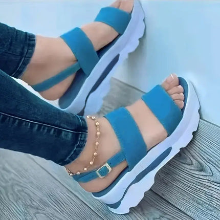 Blue Sandalia Hebilla Zen with adjustable buckle, lightweight wedge, and open-toe design, perfect for casual and formal wear.