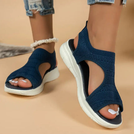 Blue Sandalia Pez Light sandals worn by a person on a neutral background, showcasing comfortable, stylish summer footwear.