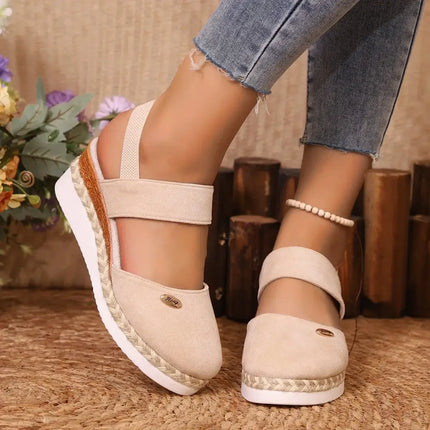 Urban style closed-toe wedge sandals with ankle strap, perfect for summer fashion, showcasing comfort and casual elegance.